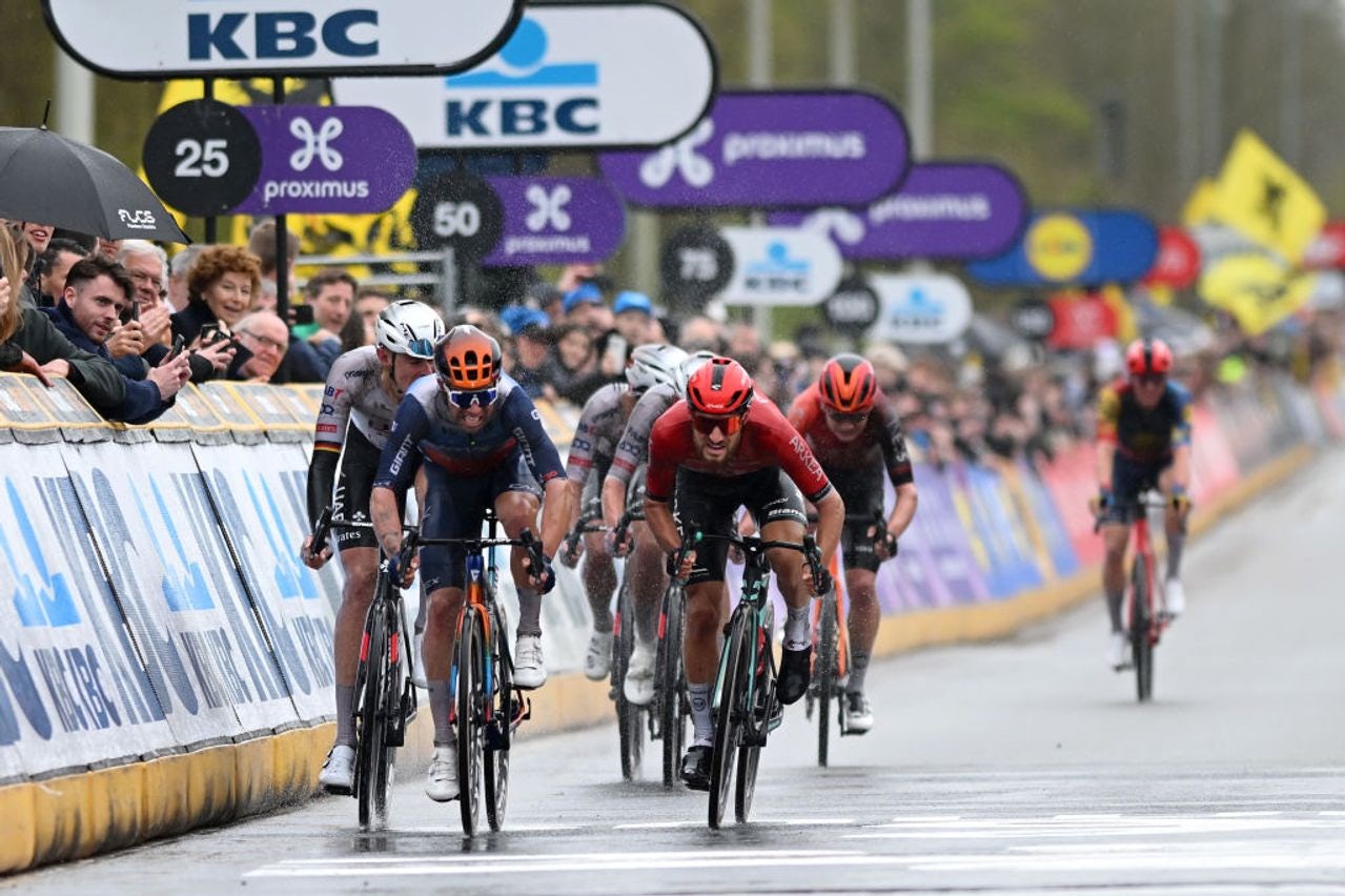 Michael Matthews (left) was judged to have impeded Nils Politt behind him in the Tour of Flanders sprint