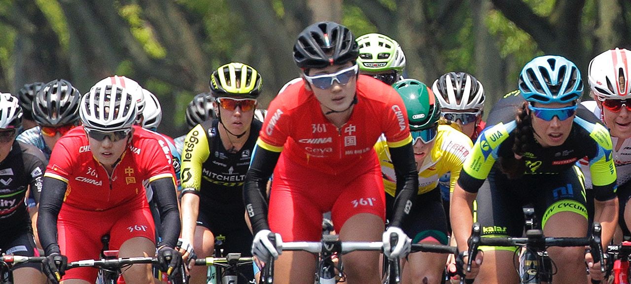 The peloton races along at the 2019 Tour of Chongming Island